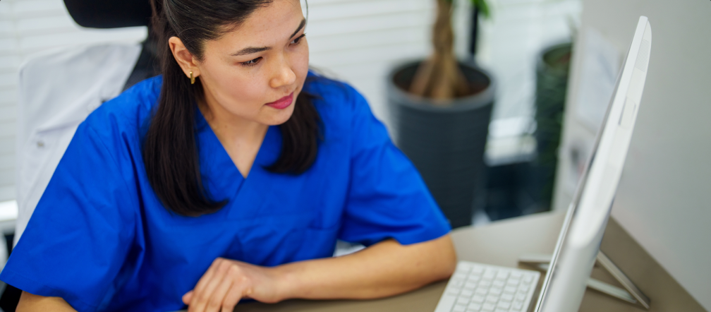Clinicians reviewing PWR device workflow